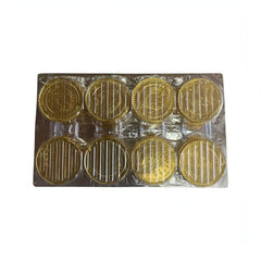 Nucita Monedas milk chocolate coins wrapped in gold foil, displayed in a tray, ideal for bulk Mexican candy.